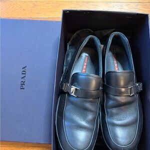 Prada Men's Elegant Black Leather Slip-Ons